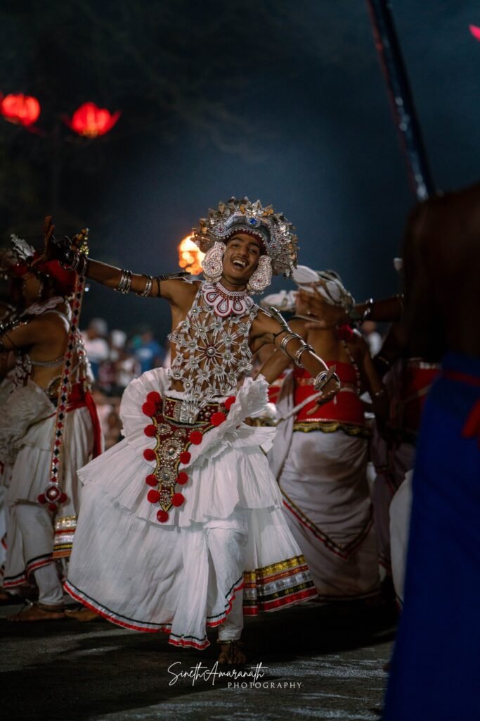 Traditional Sri Lankan dancers performing at the Kandy Esala Perahera.